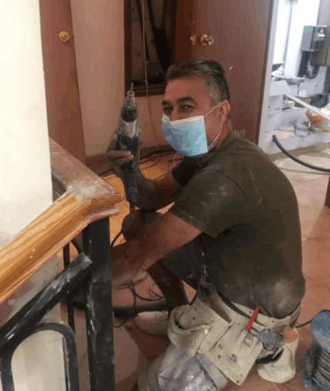 A man with a drill