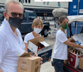 people handing out boxes